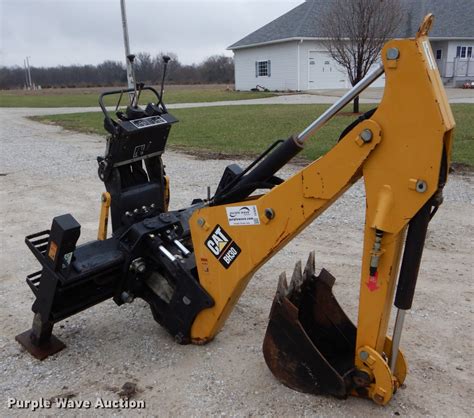 caterpillar skid steer quick attach|caterpillar skid loader attachments.